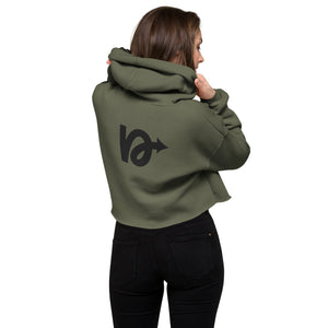 Model wearing NVR5TOP crop hoodie in urban setting – bold, island-inspired fashion
