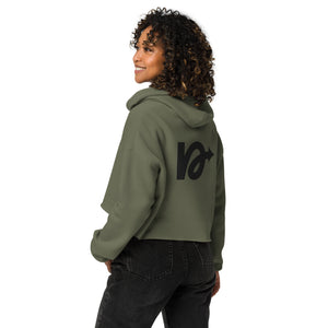 Model wearing NVR5TOP crop hoodie in urban setting – bold, island-inspired fashion