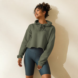 Model wearing NVR5TOP crop hoodie in urban setting – bold, island-inspired fashion